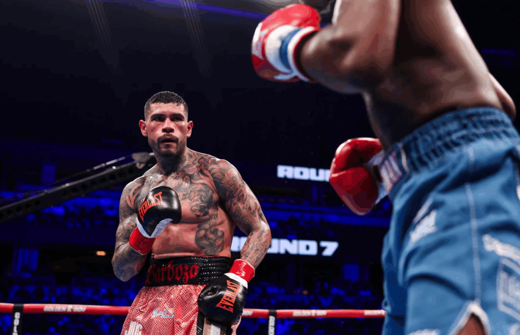 Arnold Barboza Jr. Aterriza una mano derecha contra Kenneth Sims Jr. durante su combate de peso welter en el Honda Centre de Anaheim.